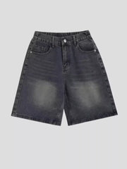 Vintage wash relaxed fit denim shorts with elastic waistband and button closure.
