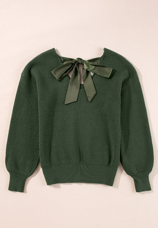 Dark green ribbed knit sweater with a satin bow detail on the back neckline.