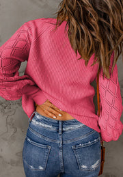 Hot Pink diamond-cut sleeve knit cardigan with textured body and ribbed cuffs.
