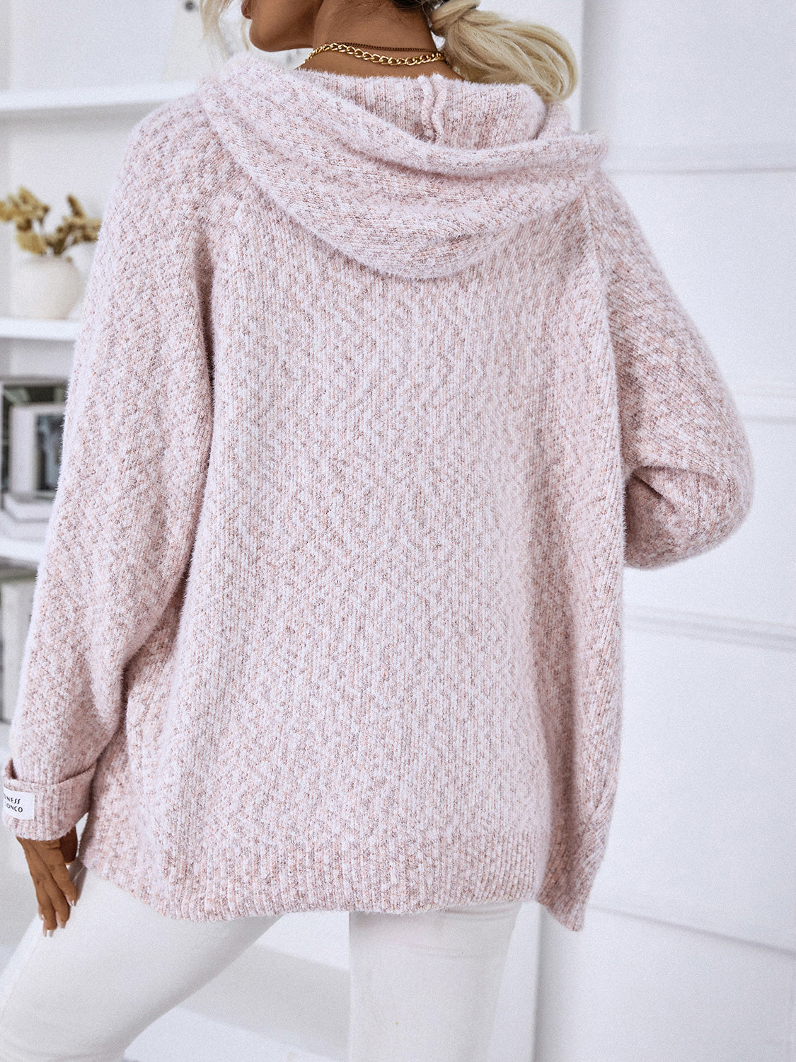 Textured knit zip-up hoodie in Dusty Pink with a subtle diamond pattern.