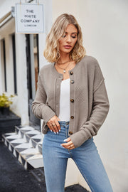 Textured knit cropped cardigan in mocha with button front and crew neck.
