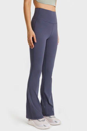 Navy flare yoga pants with a high waist and breathable fabric.