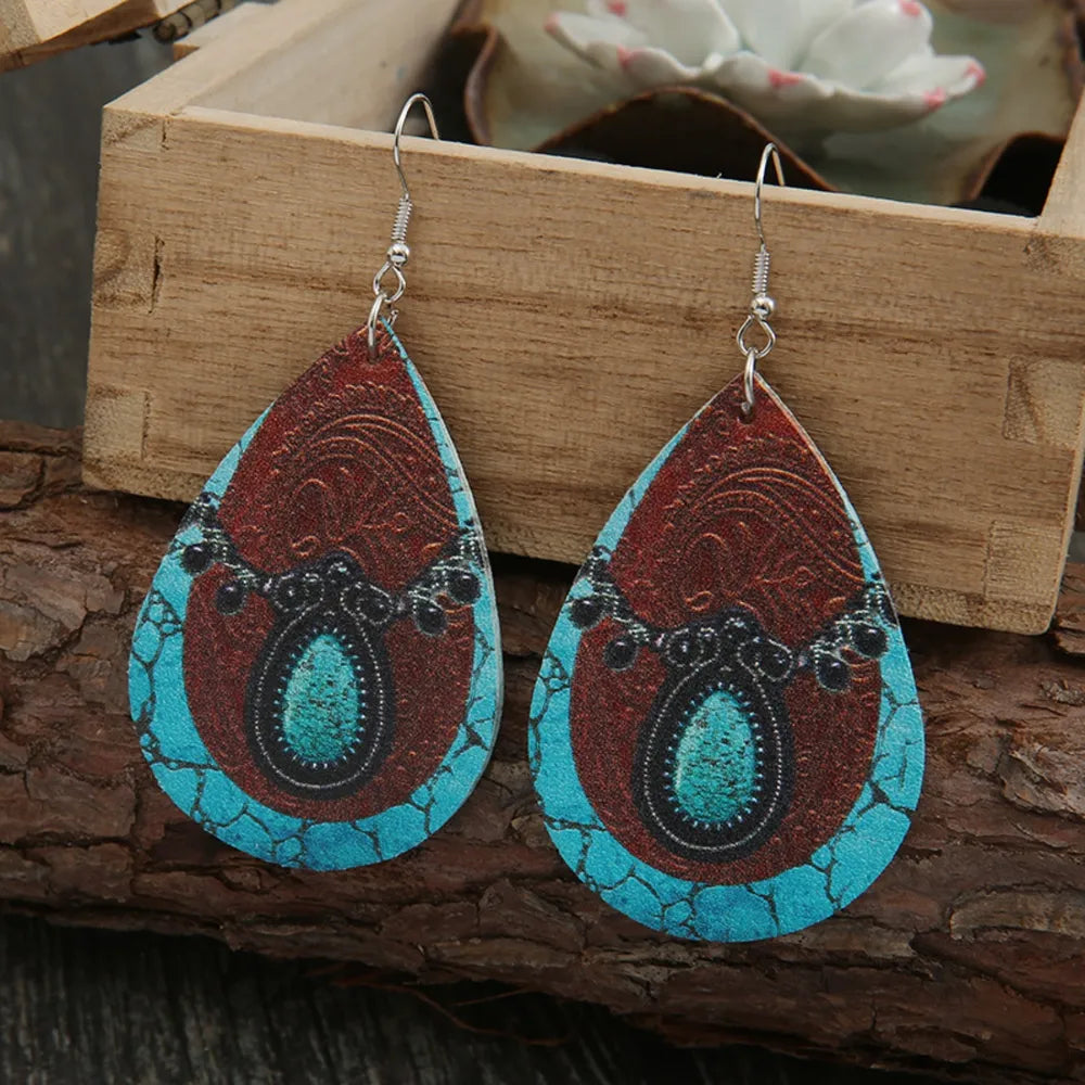 Teardrop earrings with faux turquoise and embossed cowhide pattern