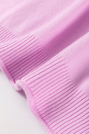 Pink knit sweater with contrast stitching detail