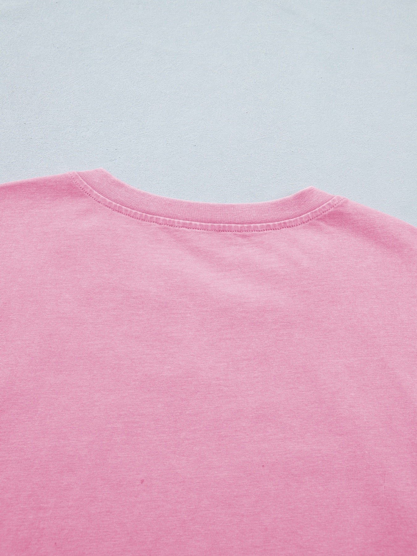 Pink mineral wash cotton tee with notched neckline detail