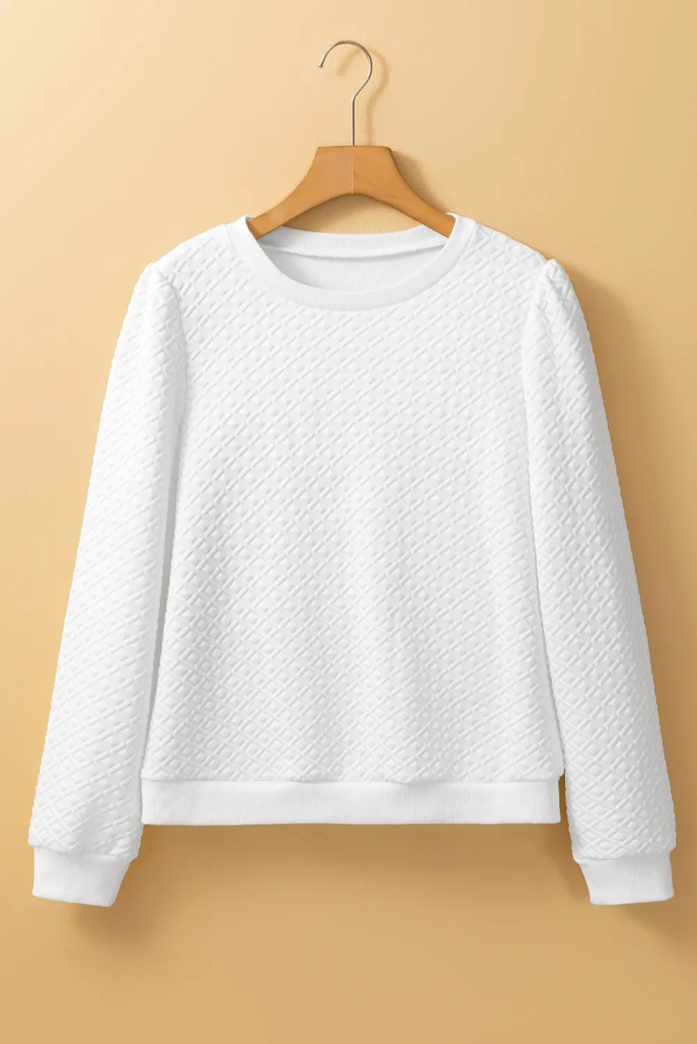 White textured crewneck pullover sweater with puff sleeves