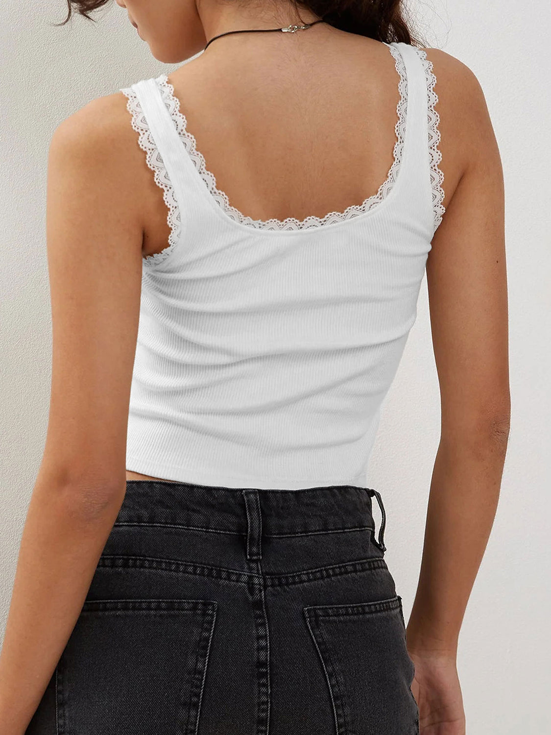 White ribbed knit cami with lace trim detail