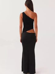 Black one-shoulder maxi dress with cutout detail and fitted skirt.