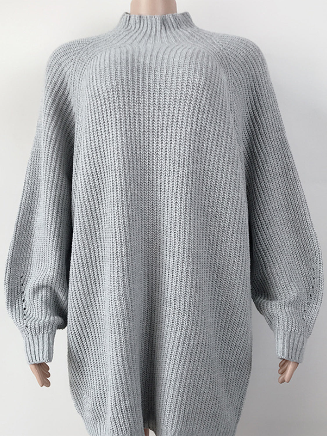 Ribbed knit cocoon turtleneck dress in Cloudy Blue acrylic with balloon sleeves and a relaxed fit.