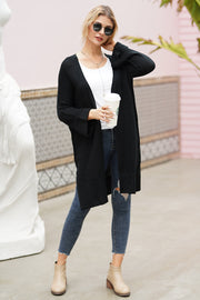 Black textured open-front maxi knit cardigan with a relaxed fit.