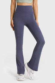 Navy flare yoga pants with a high waist and breathable fabric.