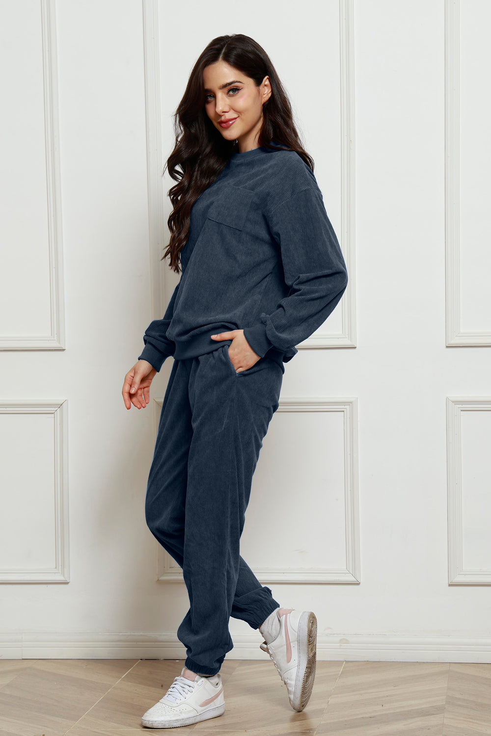 Dark Blue corduroy loungewear set with pocket detail on sweatshirt.