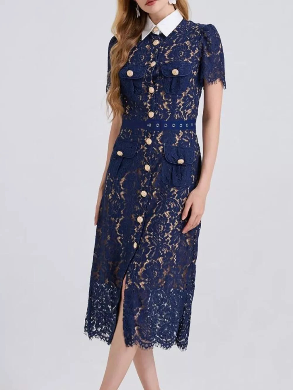 Navy lace midi dress with white collar, gold buttons, pockets, and side slit.