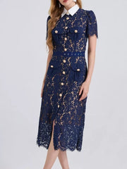 Navy lace midi dress with white collar, gold buttons, pockets, and side slit.