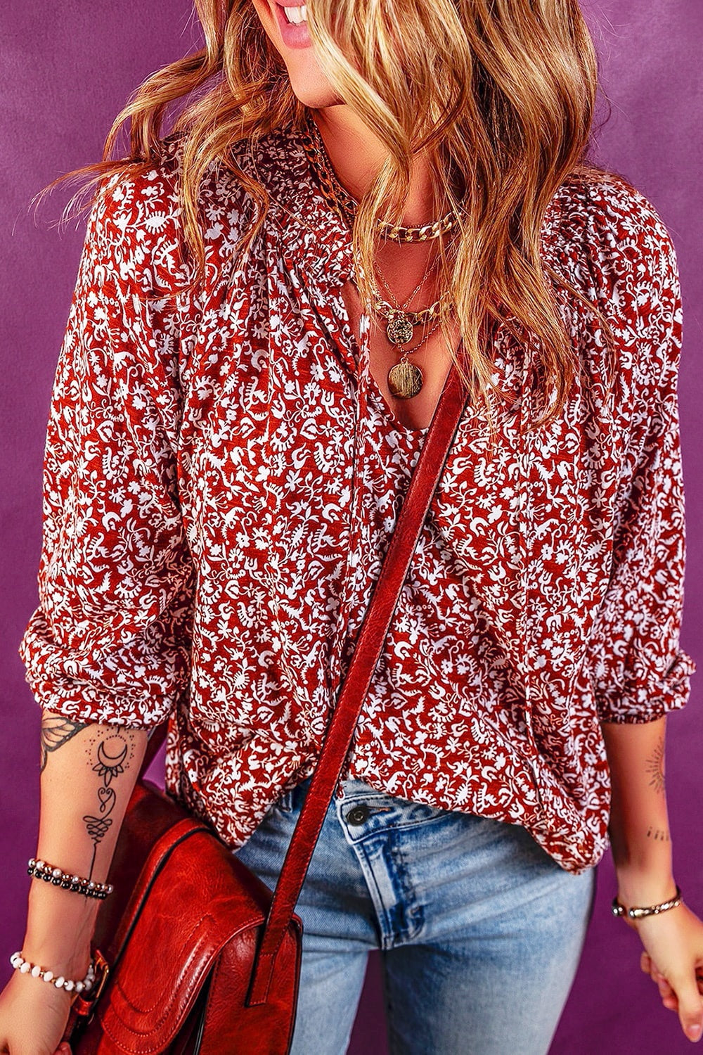 Bohemian floral print viscose blouse with tie neck and rolled sleeves in cerise.