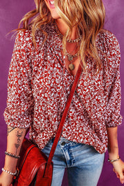 Bohemian floral print viscose blouse with tie neck and rolled sleeves in cerise.
