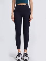 Black high-waist leggings with a seamless contour design.