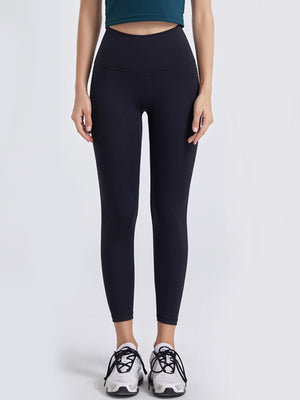 Black high-waist leggings with a seamless contour design.