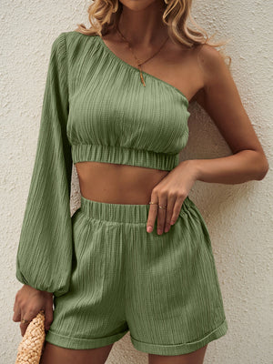 Textured one-shoulder crop top and shorts set in Matcha Green with balloon sleeve.