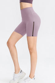 Lilac mesh-inset sculpting bike shorts with a high waist.