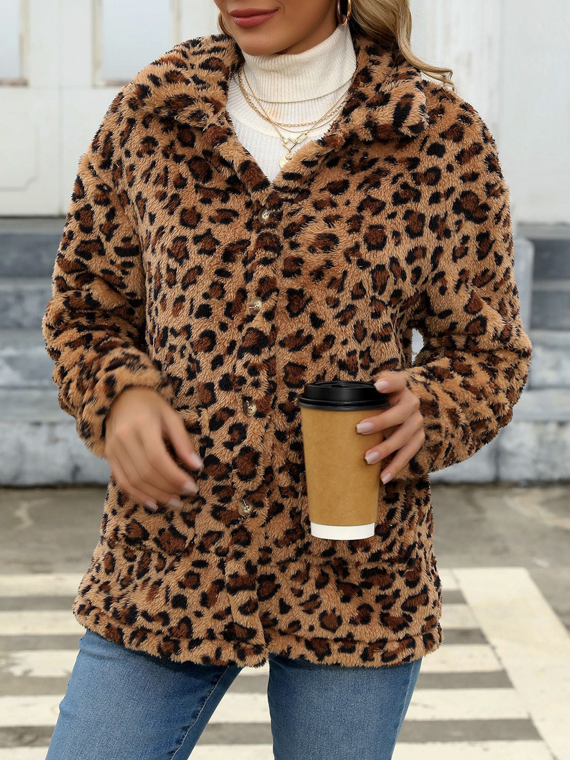 Leopard print sherpa overshirt jacket with button front and collar.