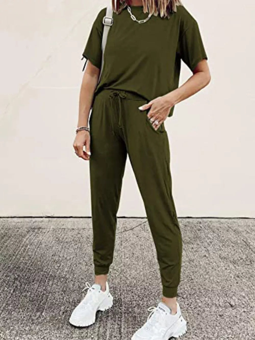Army green cotton round neck top and jogger pants set with drawstring waist.