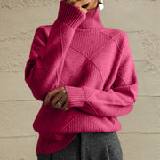 Hot Pink diamond knit turtleneck sweater with ribbed details.