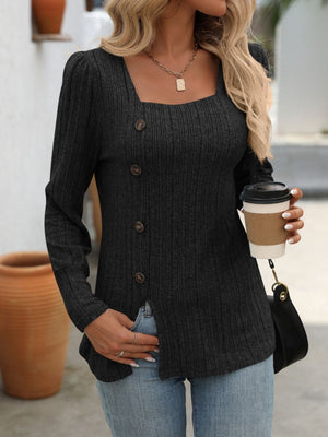 Black ribbed knit top with square neckline and side button detail.