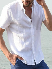 White linen resort shirt, relaxed fit, short sleeves, open collar, button front