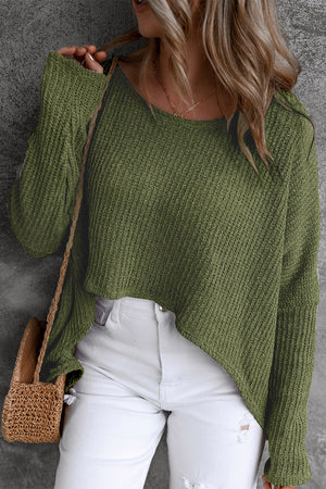 Moss green acrylic knit asymmetric slouch top with scoop neck and long sleeves.