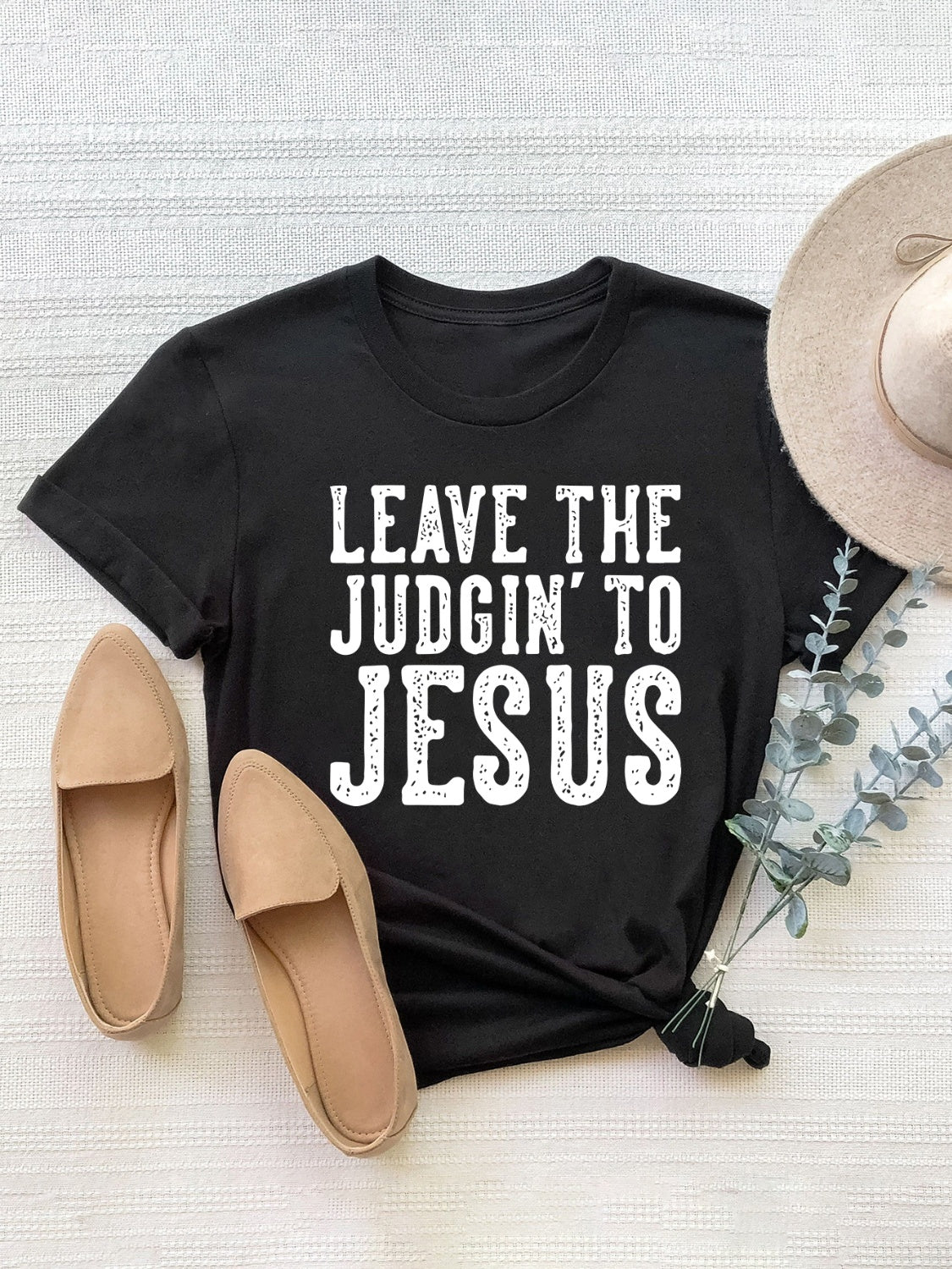 Black graphic tee with white text that reads "LEAVE THE JUDGIN' TO JESUS