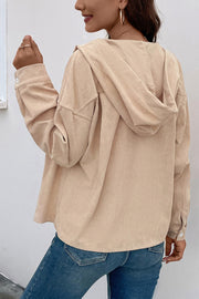Sand ribbed corduroy button-up hoodie jacket with a relaxed fit and button cuffs.