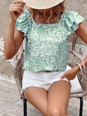 Green floral ruffle blouse with square neckline and short sleeves.