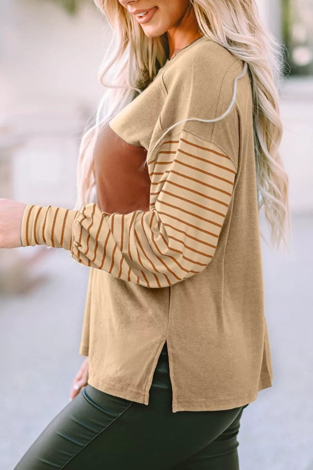 Maternity bishop sleeve shirt in mustard with colorblock and striped sleeves.