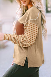 Maternity bishop sleeve shirt in mustard with colorblock and striped sleeves.