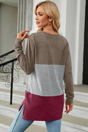 Colorblock long sleeve tee in brown, gray, and burgundy with a side slit hem.