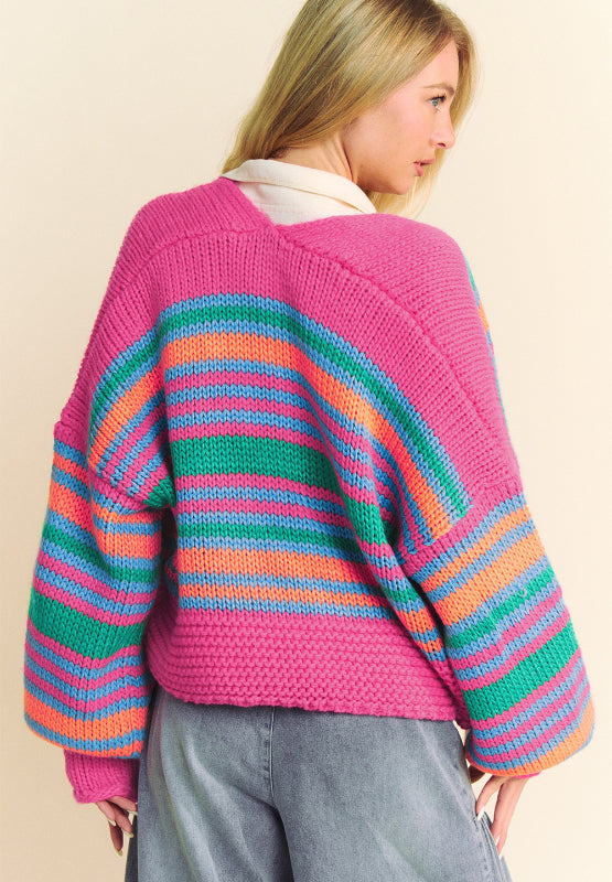 Chunky stripe balloon sleeve cardigan in pink with blue, green, and orange stripes.