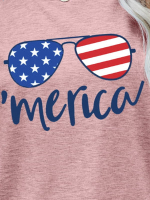 Dusty Pink t-shirt with patriotic sunglasses graphic and 'Merica script.