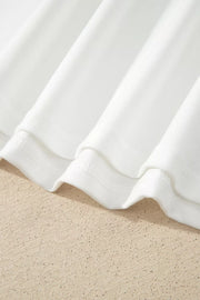 White long sleeve shirt with delicate lace trim detail and crew neckline.