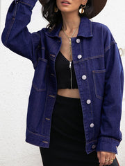 Oversized dark denim trucker jacket with contrast stitching and button front.