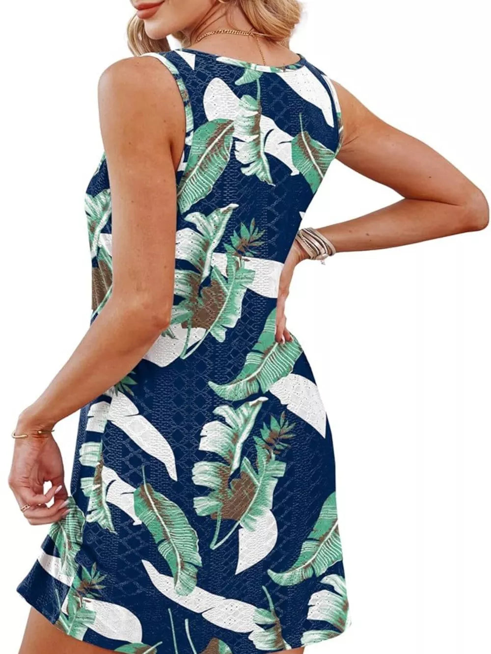 Eyelet twisted hem tank dress in multicolor tropical leaf print.