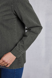 Washed dark gray denim shirt with pointed collar and button cuffs.