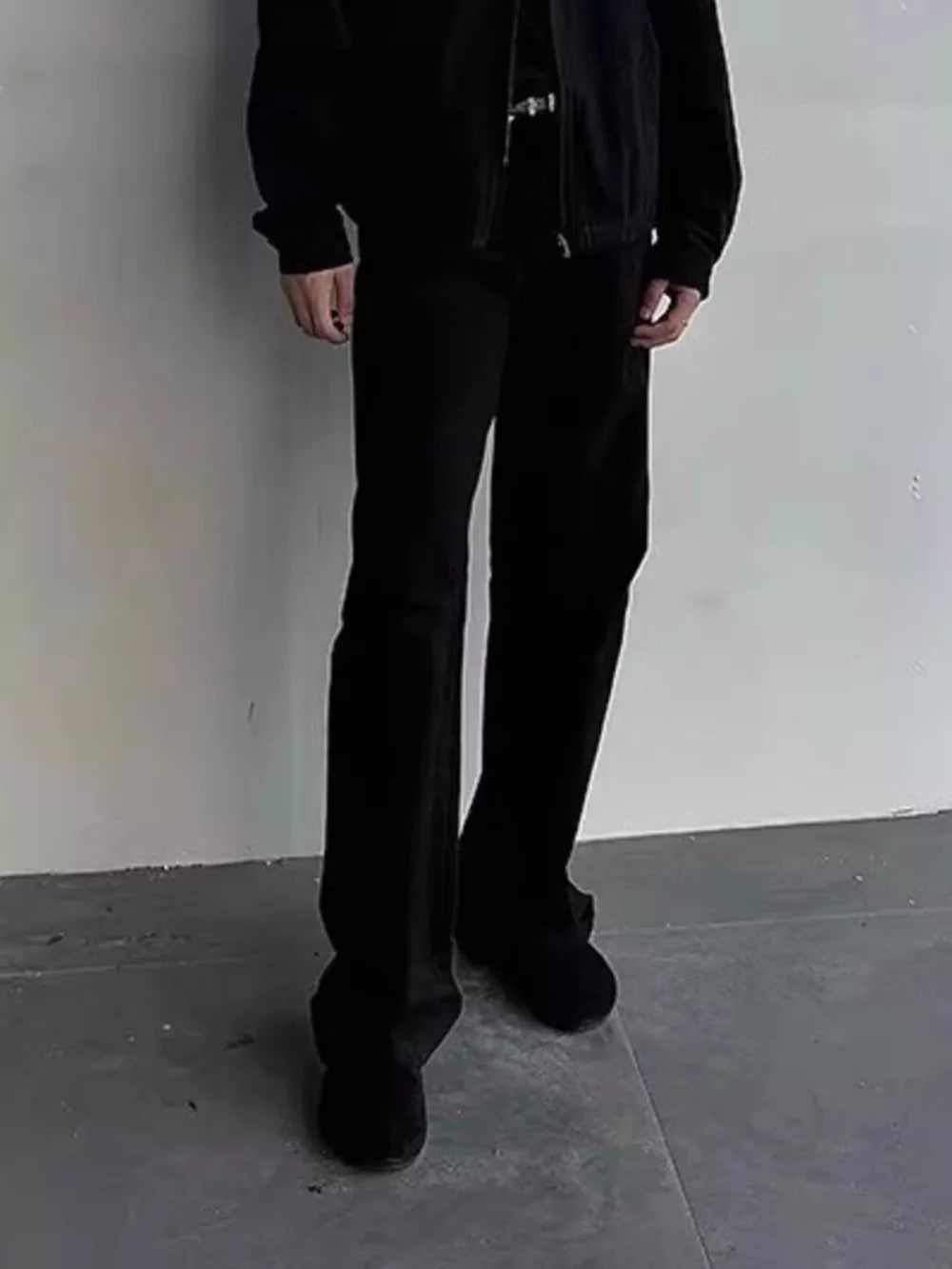 Men's black sweatpants with a relaxed fit and straight leg