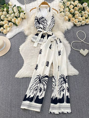 Tropical print sleeveless top and wide-leg pants set with belted detail in black and white polyester