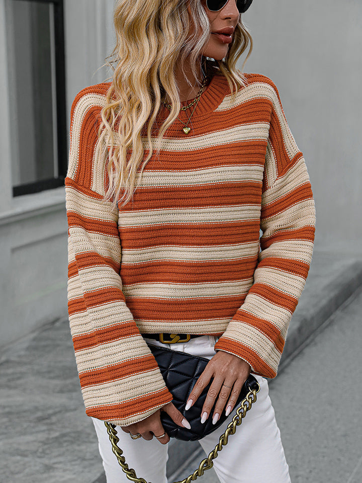 Chunky stripe relaxed fit knit sweater in burnt coral and cream acrylic with crew neck and bell sleeves.