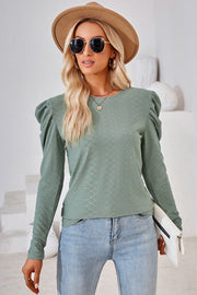 Light green textured puff-sleeve crew neck top with diamond pattern