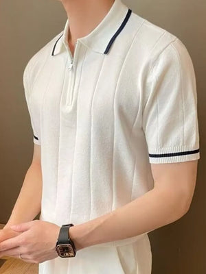 Ivory ribbed polo shirt with zip neck and contrast trim on collar and sleeves.