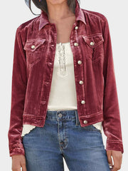 Burgundy velvet jacket with silver buttons and chest pockets.