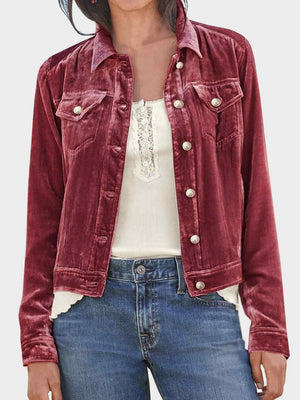 Burgundy velvet jacket with silver buttons and chest pockets.