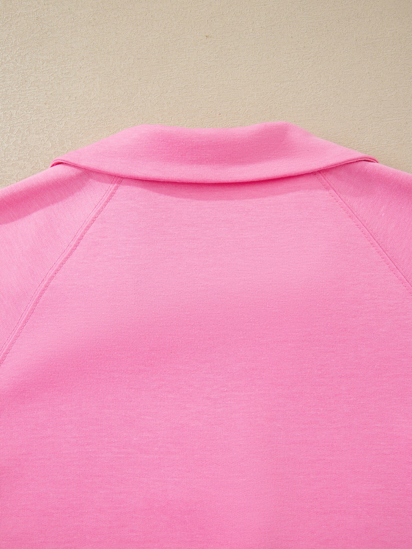 Pink cotton bikini top with V-neck and drawstring detail